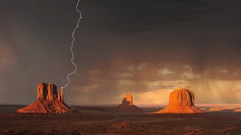 Grand Canyon Under Black Sky With Lightning during Daytime