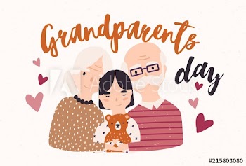 Grandfather and grandmother cuddling with grandchild
