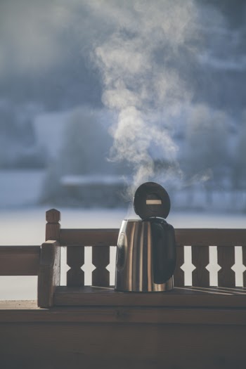 Gray and Black Electric Kettle on Wooden Bench