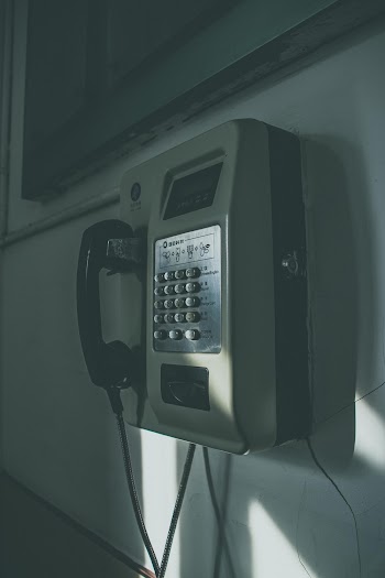 Gray and Black Public Phone