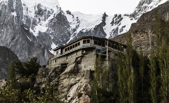 Gray and Brown Wooden House Near Mountain
