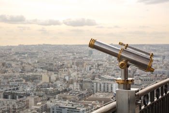 Gray and Gold Telescope on Building