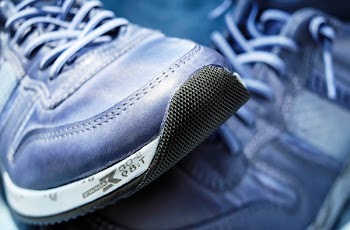 Gray and White Low Top Laced Up Running Shoes