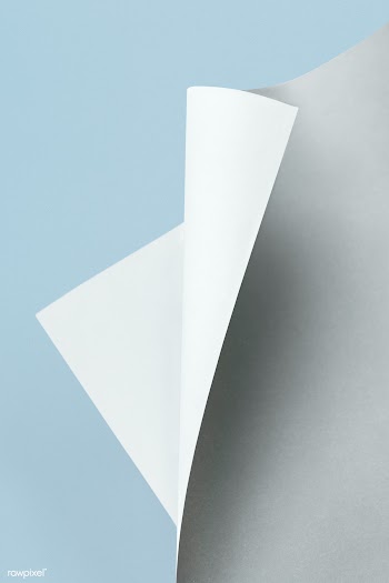 Gray and white rolled paper mockup on a blue background | Free  psd mockup - 2357585