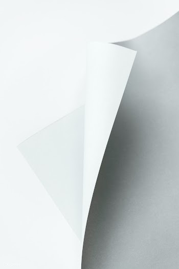 Gray and white rolled paper on a gray background | Free  photo - 2357760