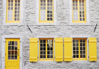 gray and yellow concrete house