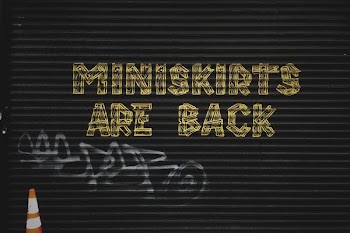 gray background with miniskirts are back text overlay