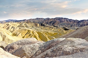 Gray Beige and Brown Rocky Mountain during Daytime