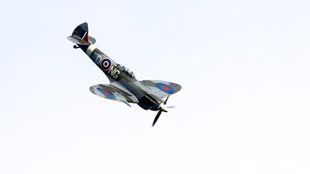 Gray Black and Blue Airplane