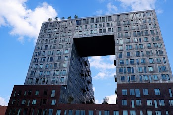 Gray Building Under Cloudy Sky