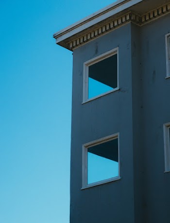 Gray Building With Square Windows