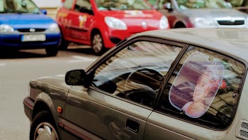 Gray Car With Queen Elizabeth Photo Window Visor Poster