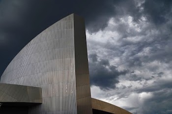 gray concrete building during cloudy day
