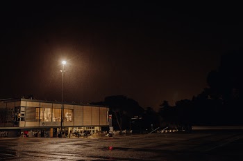 Gray Concrete Building during Night