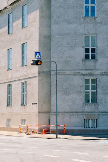 gray concrete building near road