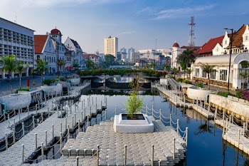 Gray Concrete Docking Platforms Between High Rise Buildings
