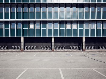 gray concrete framed glass building