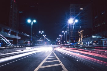 Gray Concrete Road Near Buildings