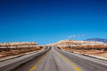 gray concrete road photograph