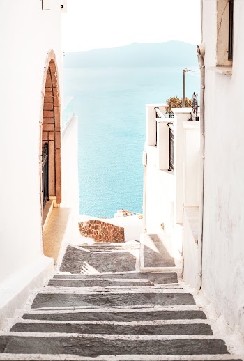 Gray Concrete Stair Across Body of Water