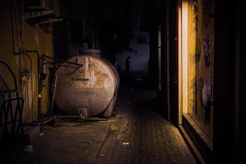 Gray Container Near Wall