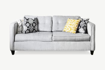 Gray couch with decorative pillows | Free PSD - rawpixel