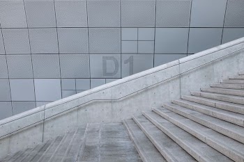 gray D1 printed wall beside stares