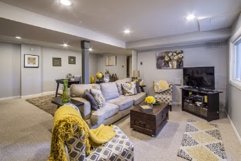 Gray Fabric 3-seat Sofa Near Black Flat Screen Tv