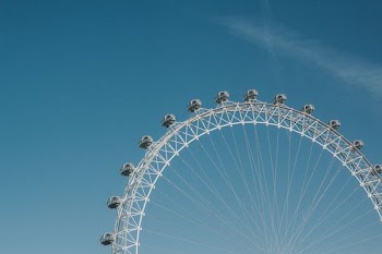 gray ferris wheel during day time