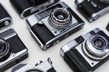 Gray Film Camera on White Surface