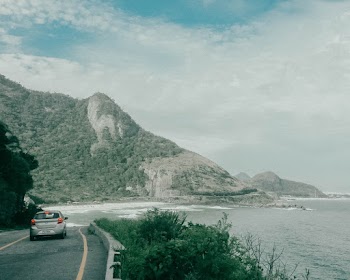 Gray Hatchback on Concrete road