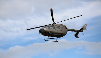Gray Helicopter on Air