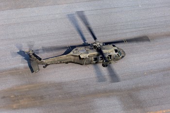 Gray Helicopter on Gray Road