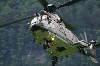 Gray Helicopter Outside during Daytime