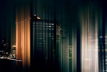 gray high-rise buildings at night time