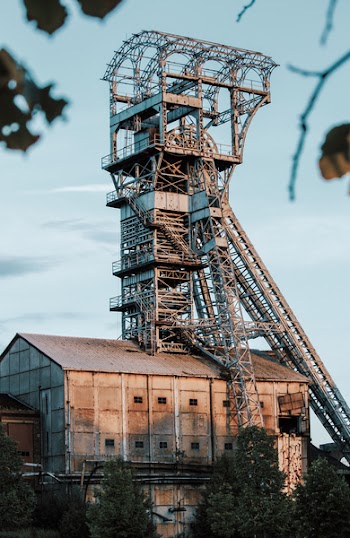 Gray Metal Tower on Top of House