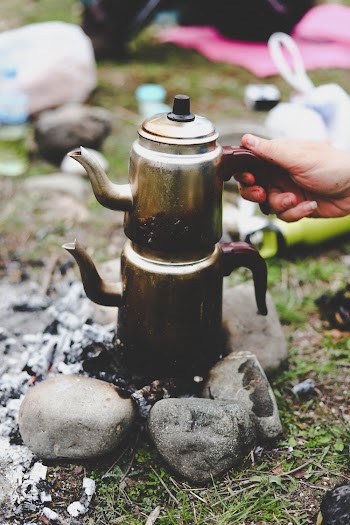 Gray Metal Turkish Kettle on Stones