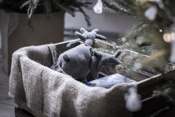 Gray Moose Plush Toy on Crate
