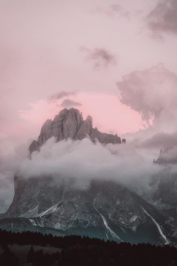 Gray Mountain Near Body of Water