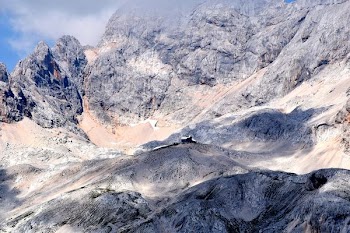 gray mountain under blue sky at daytime