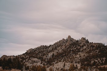 Gray Mountains Under Cloudy Sky