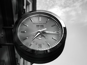 Gray Patek Philippe Clock Displaying 7:16