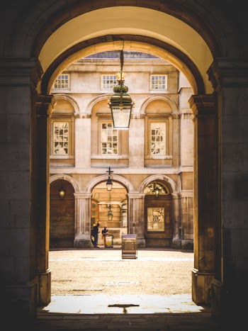 Gray Pendant Lamp Hanging on Arch Pathway