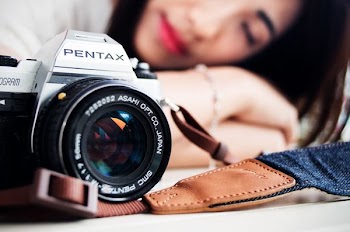 gray Pentax camera selective focus photography