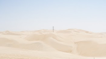 Gray Pole on Desert