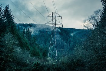 Gray Power Line Under Cloudy Sky