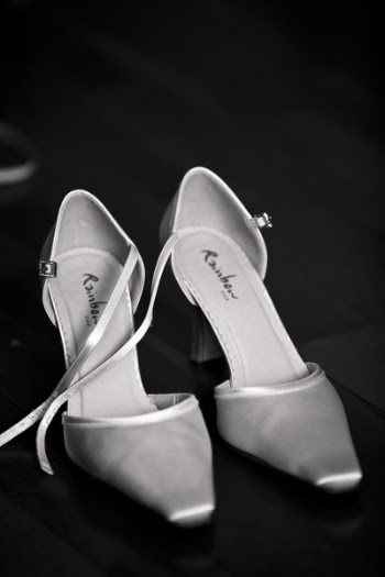 Gray Rainbow Heeled Sandals on Black Surface