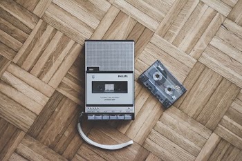 gray recorder with cassette tape