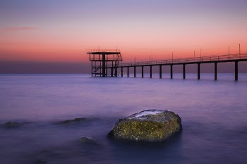 Gray Rock Near Wooden Dock