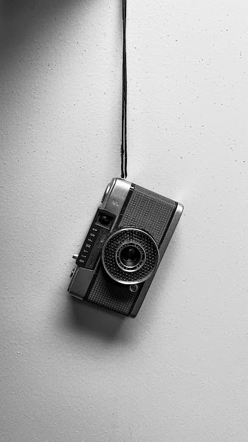 Gray scale Photo of a Camera